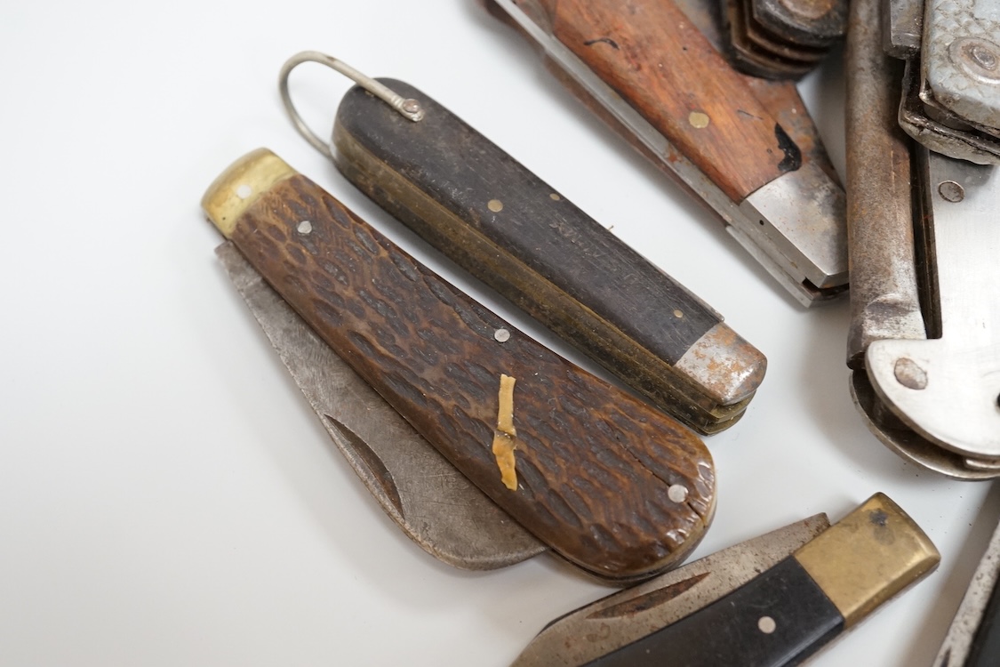 A collection of assorted penknives and whistles